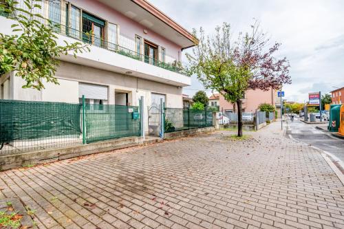 a brick sidewalk in front of a building at Villa Trieste in Venice