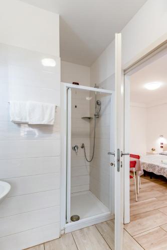 a bathroom with a shower and a sink at Villa Trieste in Marghera