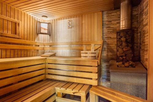 a sauna with wooden walls and wooden floors at Casa Navajas in Jérica