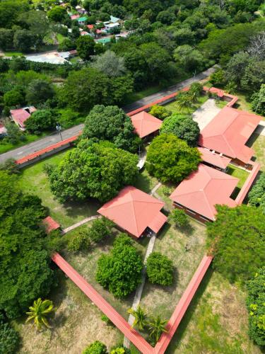 an overhead view of a school with red roofs at Hotel Hacienda Casa del Viento in Cuajiniquil