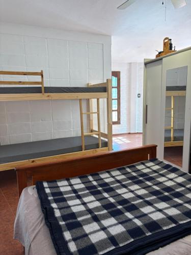 Ένα ή περισσότερα κρεβάτια σε δωμάτιο στο Lugarcito