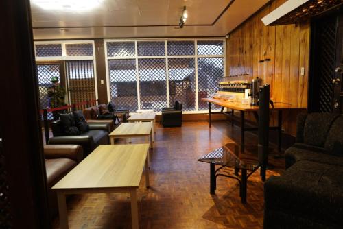 Χώρος καθιστικού στο Baguio Feels Bed & Breakfast