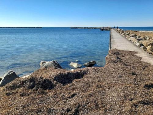 a path in the water next to a pier at 6 person holiday home in Karrebæksminde-By Traum in Karrebæksminde