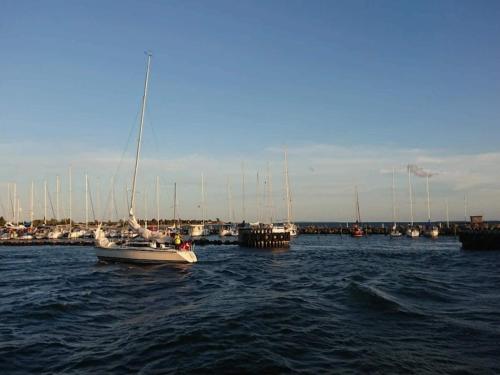 a boat in a body of water with other boats at 6 person holiday home in Karrebæksminde-By Traum in Karrebæksminde