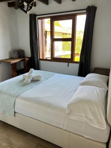 Ένα ή περισσότερα κρεβάτια σε δωμάτιο στο Apartamento Campestre Jericó Antioquía La Esmeralda