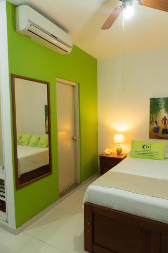 Кровать или кровати в номере Hotel Country Boutique