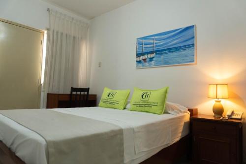 Кровать или кровати в номере Hotel Country Boutique