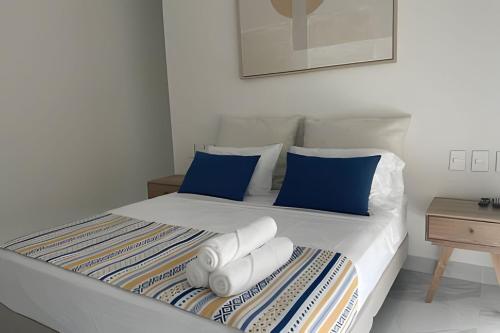 Voodi või voodid majutusasutuse Apartamento santa marta sui bello horizonte+playa+ac+pool+beach toas