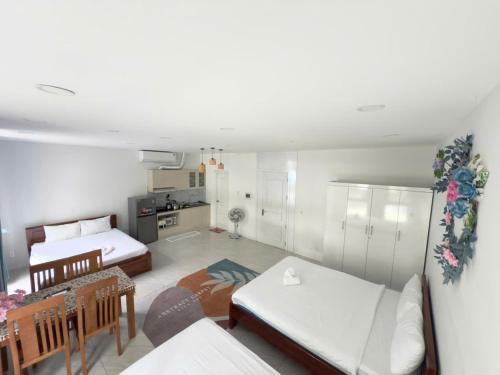 Kuchyň nebo kuchyňský kout v ubytování Ngân Hà Star Homestay - Grand World Phú Quốc