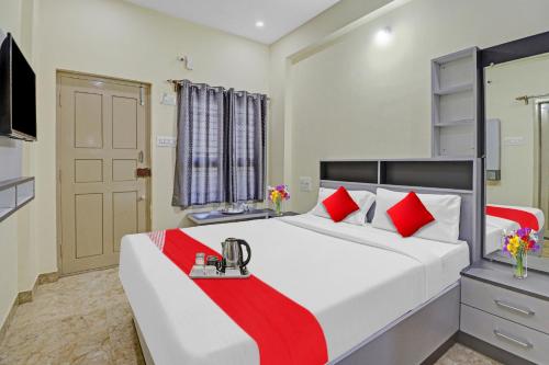 Imagen de la galería de Hotel O I Care With Greenery Comforts, en Tumkūr