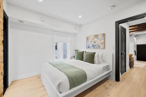 Ένα ή περισσότερα κρεβάτια σε δωμάτιο στο Modern Parkdale Getaway 1-Bedroom Parking