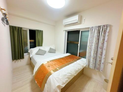Ueno Sakura Inn 上野公园にあるベッド
