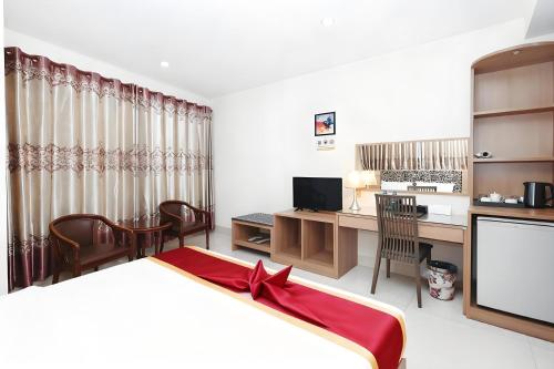 Una cocina o cocineta en 中青秋果酒店金边王宫店 True Go Hotel