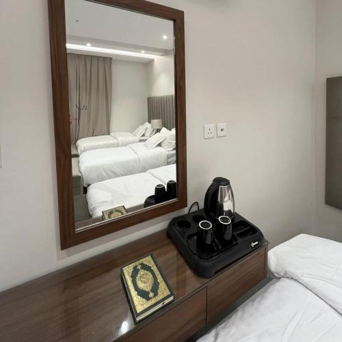 Ένα ή περισσότερα κρεβάτια σε δωμάτιο στο Ksa Zad Hotels