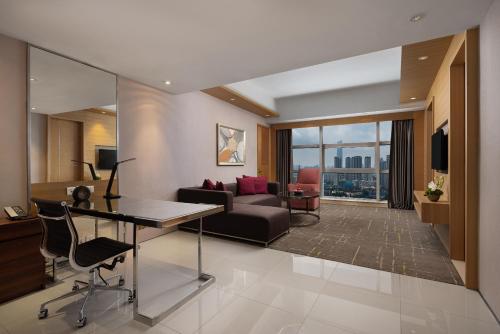 Un lugar para sentarse en New World Wuhan Hotel