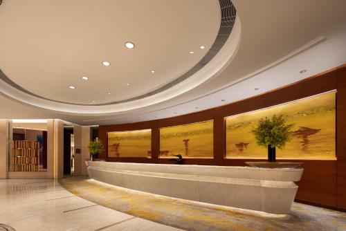 Galería fotográfica de New World Wuhan Hotel en Wuhan