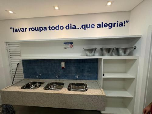 a kitchen with a counter top with bowls on it at Studio Luxo JH 706 Best Location in Gleba - 1 Quarto in Londrina