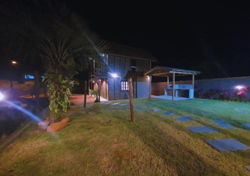 Κήπος έξω από το Hospedaria Chalés Rota Do Sol PDR - Hospedagem para casais, famílias e grupos