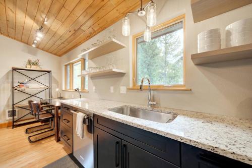 a kitchen with a sink and a counter top at 382 Sunburst in Big Sky