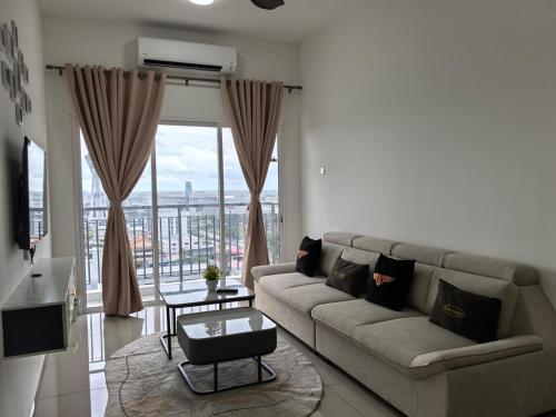 Χώρος καθιστικού στο D Aman Infinity Pool and AS Tower View Homestay 03