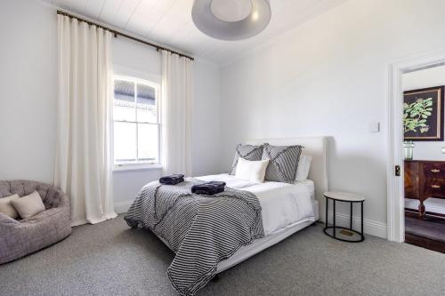 Ένα ή περισσότερα κρεβάτια σε δωμάτιο στο Glenworth House - Glenworth Estate