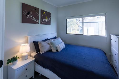 Postel nebo postele na pokoji v ubytování 3 Sprinkler Drive