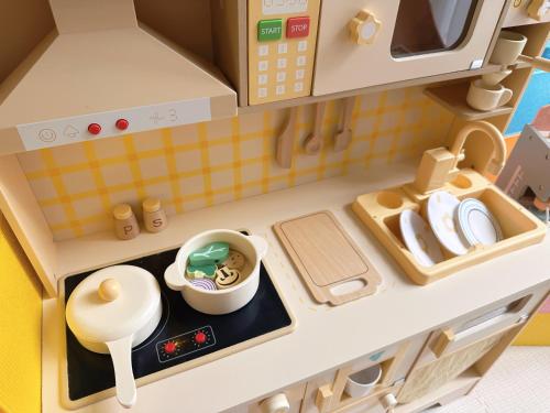 a toy kitchen with a sink and a stove at Opposite Legoland 5mins Medini DPristine 8 to 10pax in Nusajaya