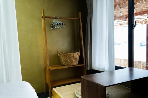 a room with a desk and a table and a window at Ruby's Home- Doc Let's House 