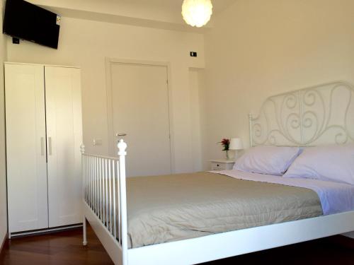 Postel nebo postele na pokoji v ubytování Sui tetti b&b