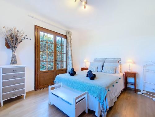 Katil atau katil-katil dalam bilik di Villa Isabella - Avec piscine et vue panoramique
