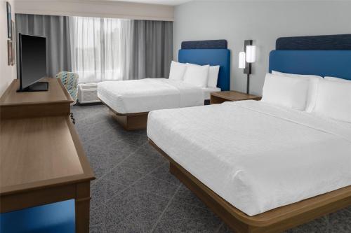 Un ou plusieurs lits dans un hébergement de l'établissement Hampton Inn Fort Lauderdale Downtown Las Olas Area
