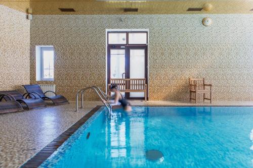 Majoituspaikassa Olympic Village tai sen lähellä sijaitseva uima-allas