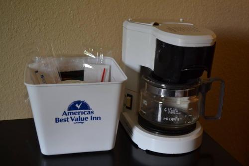 a blender sitting on a counter next to a container at Americas Best Value Inn Smithfield in Smithfield