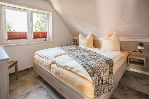 Ένα ή περισσότερα κρεβάτια σε δωμάτιο στο Ferienhaus Tura