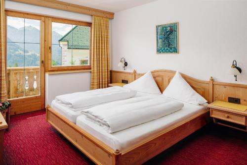 Posteľ alebo postele v izbe v ubytovaní Appartements Maria Theresia