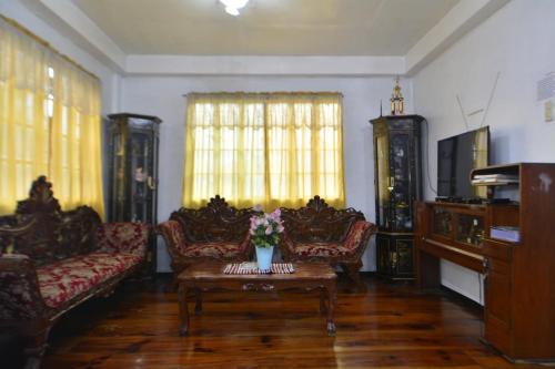 Posezení v ubytování Carlos Residence