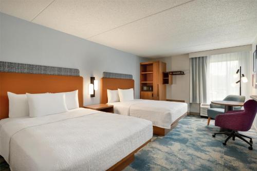 Ένα ή περισσότερα κρεβάτια σε δωμάτιο στο Hampton Inn Hagerstown