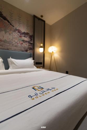 Katil atau katil-katil dalam bilik di Golden New Hotel-Smart Hotel