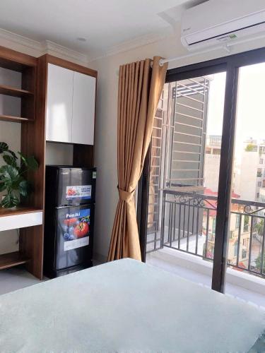 Ένα ή περισσότερα κρεβάτια σε δωμάτιο στο Hera West Lake Apartment