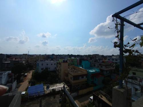 a view of a city from a building at Birsa Munda Airport Nature Nook in Rānchī