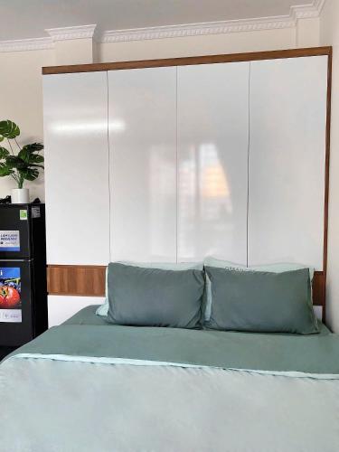 Ένα ή περισσότερα κρεβάτια σε δωμάτιο στο Hera West Lake Apartment