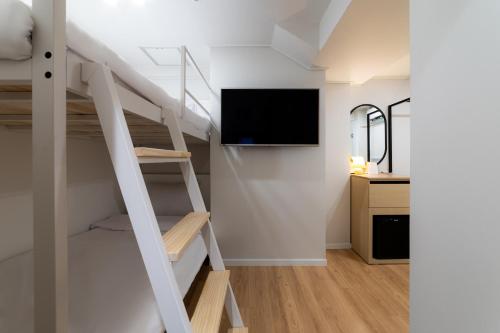 Cama o camas de una habitación en ZIYOLK Myeongdong