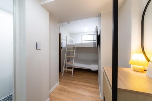 Cama o camas de una habitación en ZIYOLK Myeongdong