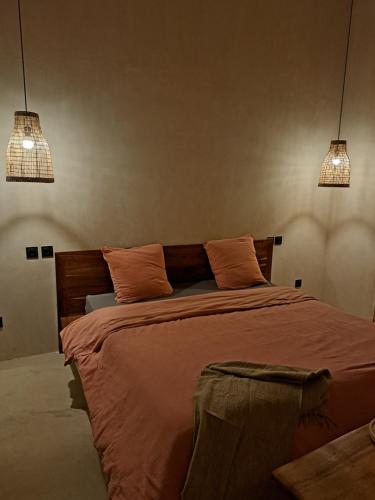 Postel nebo postele na pokoji v ubytování Villa Face a l'océan