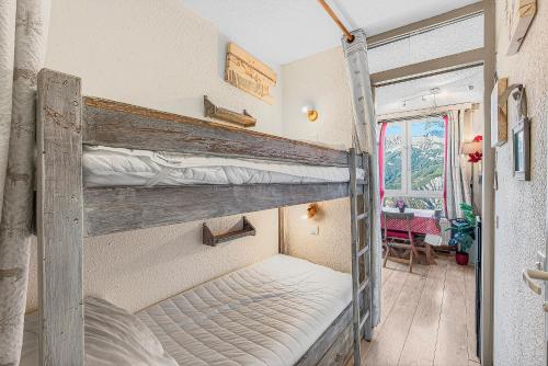Postel nebo postele na pokoji v ubytování Chaleureux Appartement 4 Couchages