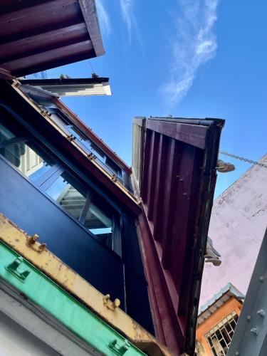 a truck with its door open on the roof at Hybrit box in Sathani Khlong Rian