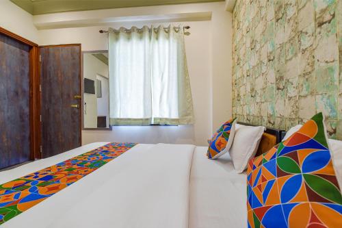 Postel nebo postele na pokoji v ubytování Hotel Bungalow 18