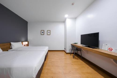 Телевизор и/или развлекательный центр в Icon Park Hotel, Chiang Mai- SHA Extra Plus