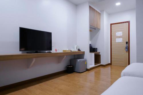 Телевизор и/или развлекательный центр в Icon Park Hotel, Chiang Mai- SHA Extra Plus