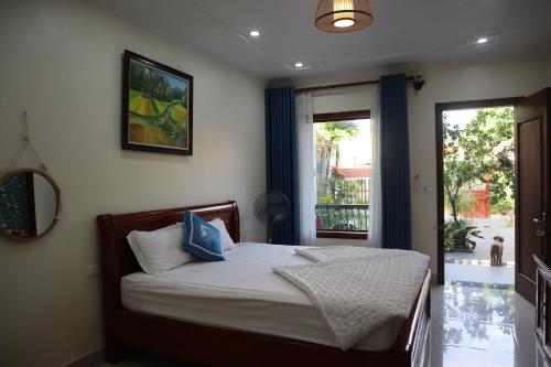 Postel nebo postele na pokoji v ubytování Mai Mountain Homestay